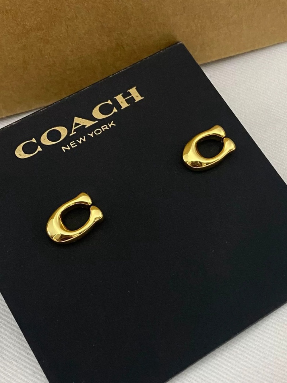 Coach Gold Plated Copper Stud E